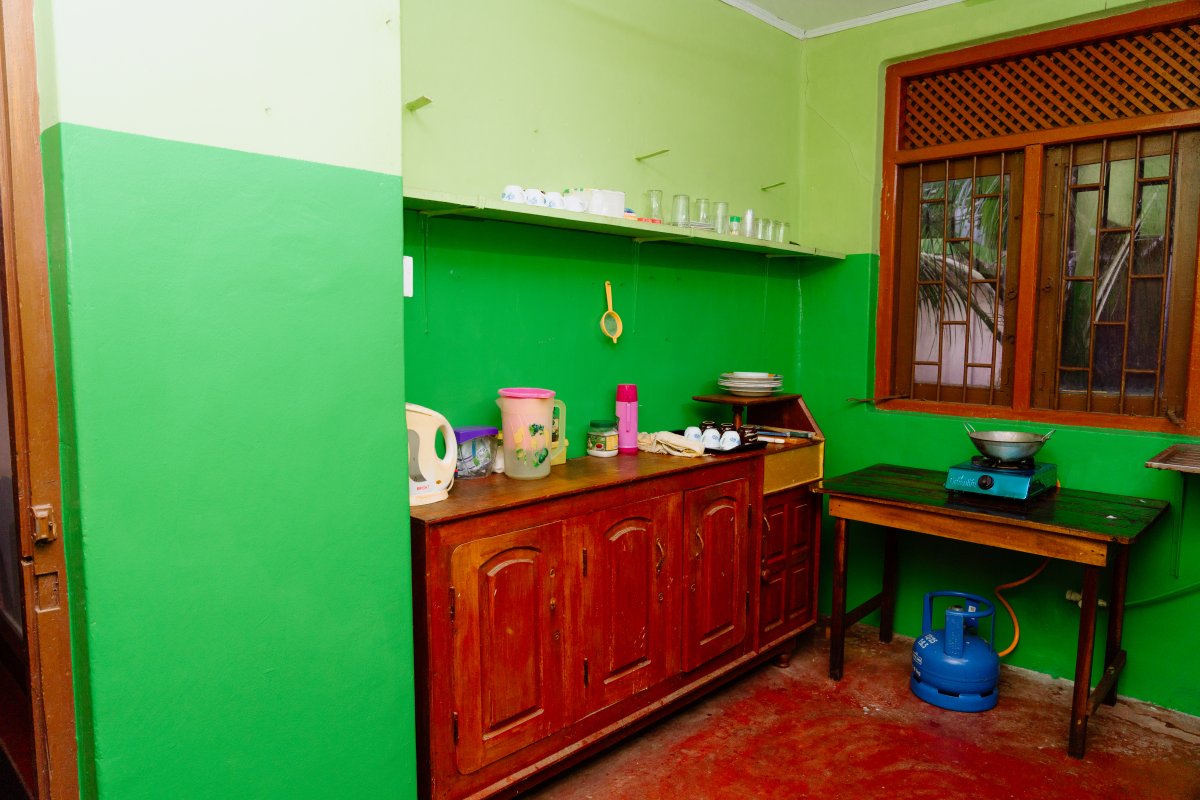 Guest Kitchen with Gas Stove and Cookware - Batti Lagoon View Hotel